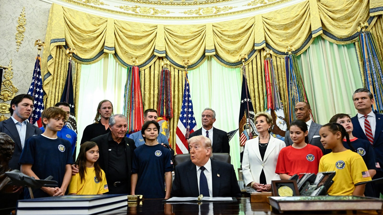 Trump Rants About Iran War and Trans Athletes to Children in Oval Office