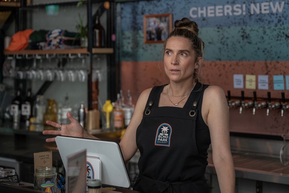 Genevieve Hegney as Chiara in Colin From Accounts season 3, streaming on Paramount+, 2026.