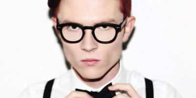 Comedian Rhys Nicholson fixes his tie