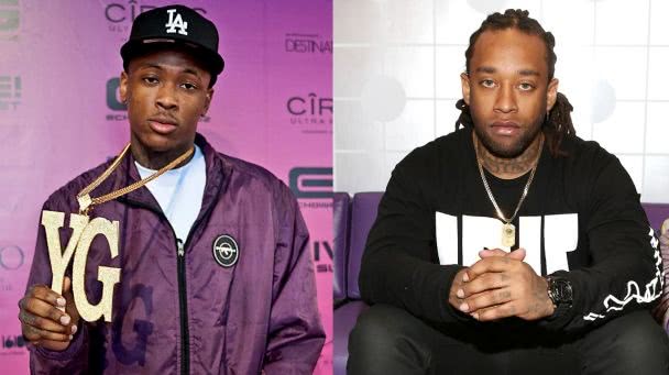 Hip hop artists YG, wearing a LA Lakers cap and purple jacket, and Ty Dolla $ign, wearing a black hoodie and sitting on a purple sofa