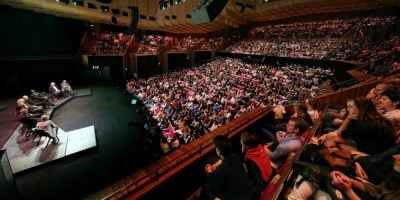 An audience at the Sydney Opera House enjoys a panel talk