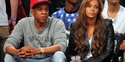 Shawn 'Jay-Z' Carter & Beyoncé watching a basketball game