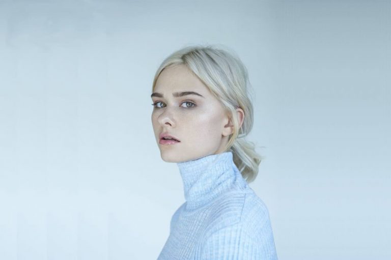 Nicole Millar press shot 2017 blonde with blue top