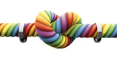 A rainbow coloured rope ties the knot.