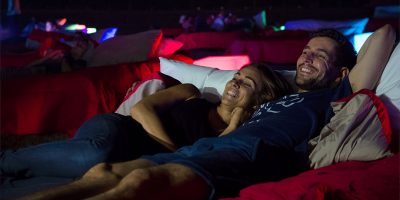 People watching movies in bed