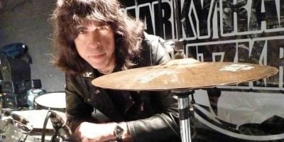 Marky Ramone sitting at his drum set