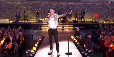 Macklemore performing at the NRL Grand Final