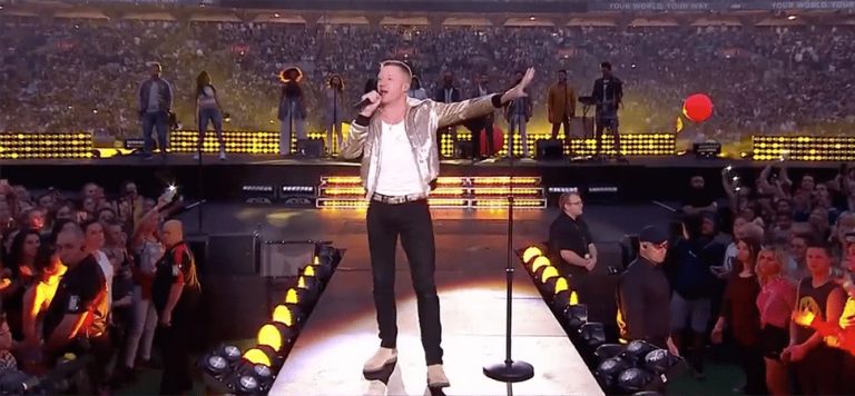 Macklemore performing at the NRL Grand Final