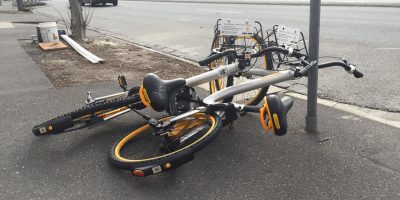 Image showing an oBike strewn along a footpath