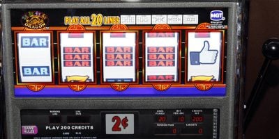 A slot machine with a Facebook 'like' symbol