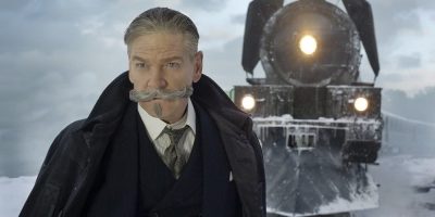 Kenneth Branagh before a train in Murder On The Orient Express