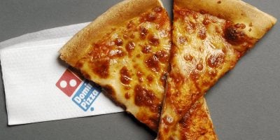 A picture of a cheese pizza from Domino's