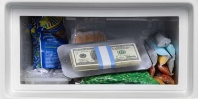 Image of money being kept in a freezer