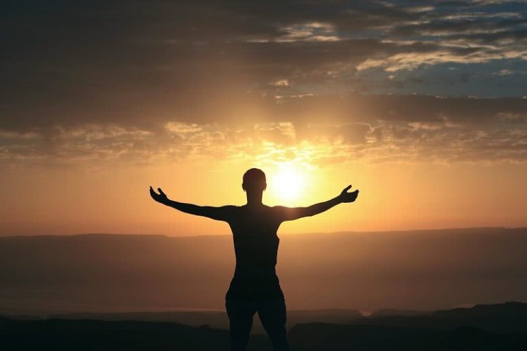 spiritual man with sunset