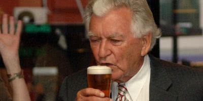 Photo of Bob Hawke drinking a beer