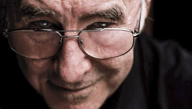 clive james black background