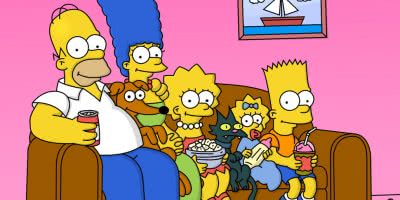 Screenshot from The Simpsons where they're sitting on the famed sofa.