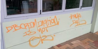 A Melbourne cafe has been targeted with anti-vax graffiti already