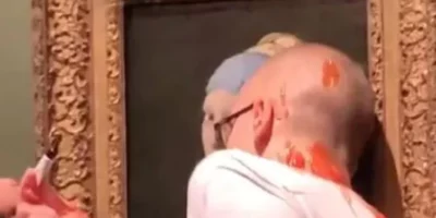 dutch activist glues head to johannes vermeer art