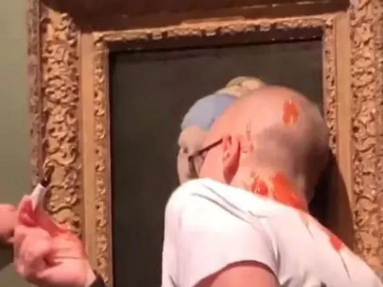 dutch activist glues head to johannes vermeer art