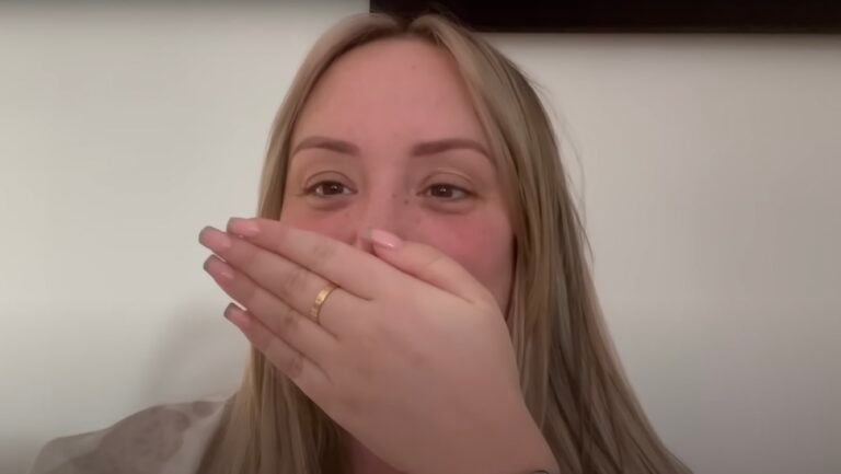 Charlotte Crosby covers mouth with hand