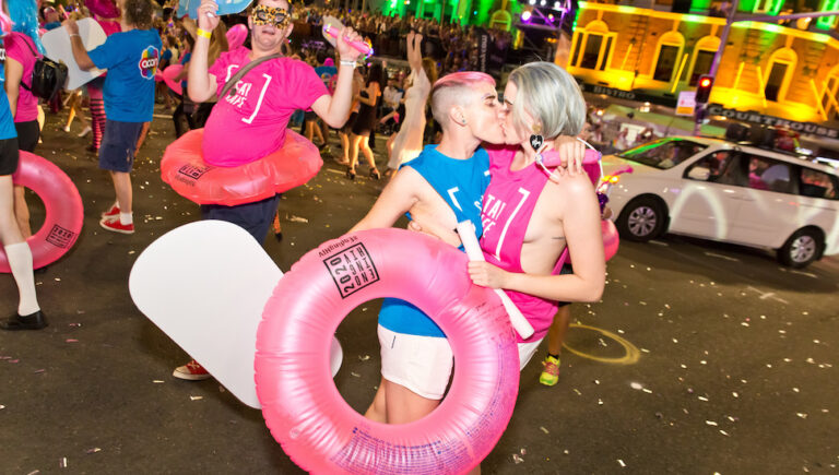 A dating kiss at Mardi Gras