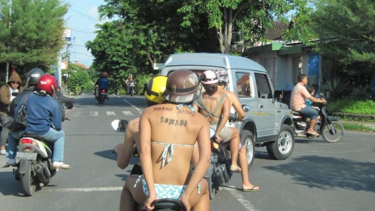 Tourists in Bali on a scooter