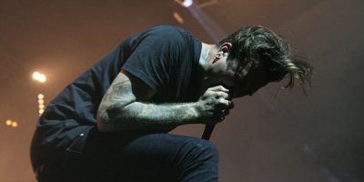 Joel Birch onstage with the Amity Affliction (2014)