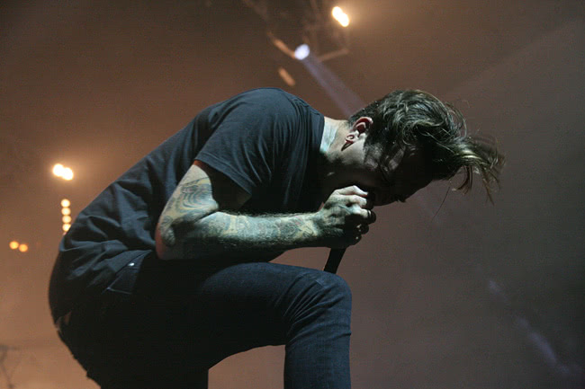 Joel Birch onstage with the Amity Affliction (2014)