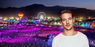 Diplo in white shirt with crowed, ferris wheel and mountains in background.