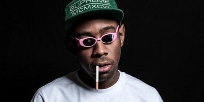 Tyler, The Creator with a cigarette in his mouth