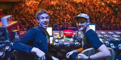 Triple j presenters Ben and Liam in front of a crowd