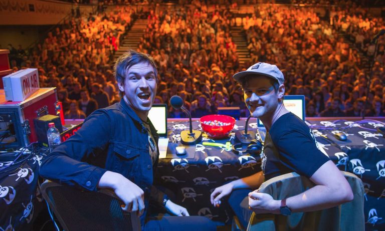 Triple j presenters Ben and Liam in front of a crowd