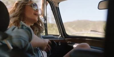 A screenshot of Delta Goodrem's Apple Music ad