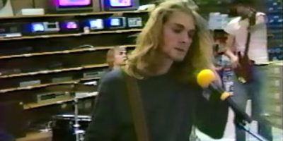 A young Nirvana perform