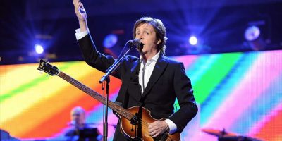 Paul McCartney performing live on stage