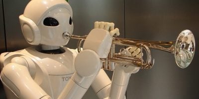 A robot playing a trumpet