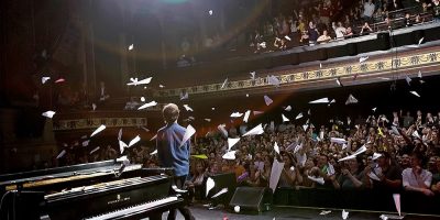 Ben Folds gets bombarded with paper planes onstage