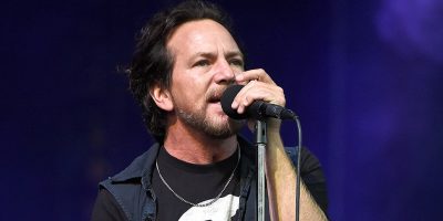 Pearl Jam frontman Eddie Vedder performing live