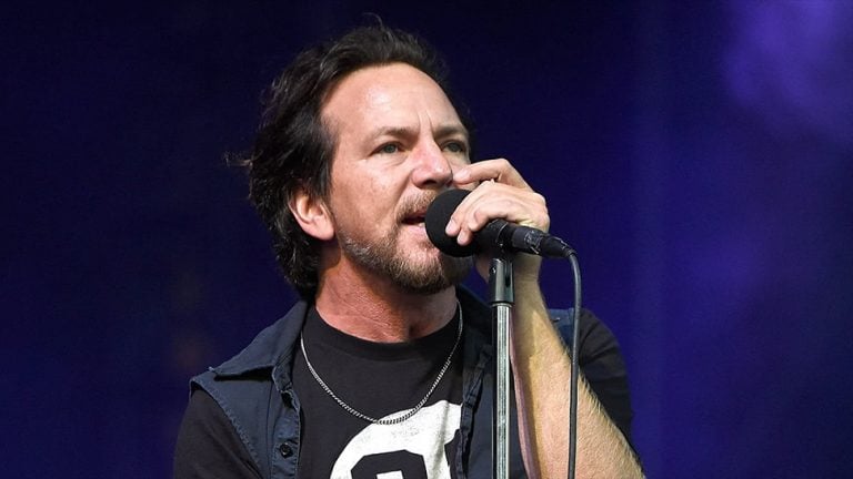 Pearl Jam frontman Eddie Vedder performing live