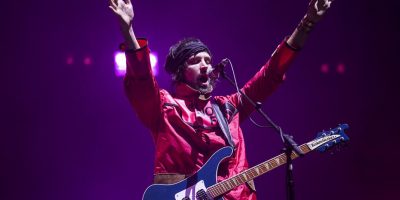 Kasabian's Sergio Pizzorno playing at Reading Festival 2017