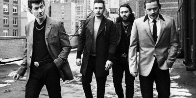 Black and white image of English rock group Arctic Monkeys