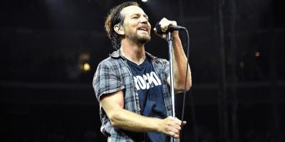 Pearl Jam frontman Eddie Vedder performing live