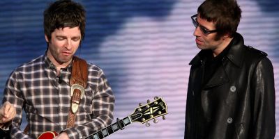 Liam and Noel Gallagher onstage