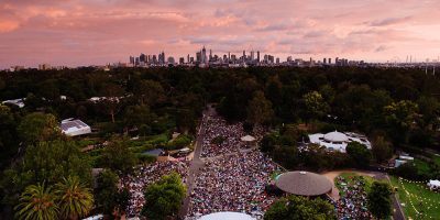 An aerial ahot of Melbourne Zoo Twilights and the city skyline