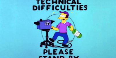 The Simpsons' technical difficulties sign featuring a drunk cameraman