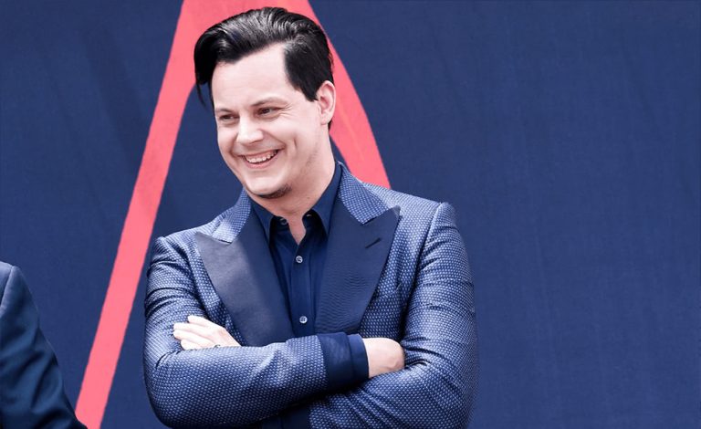 Blues-rocker Jack White photographed wearing a blue suit.