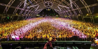 An artist performing at the Coachella music festival