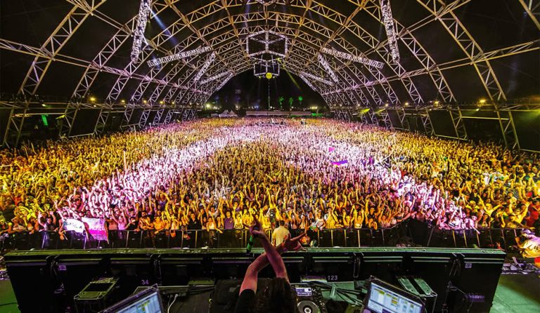 An artist performing at the Coachella music festival