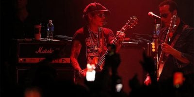 Johnny Depp performing with Stone Temple Pilots guitarist Robert DeLeo